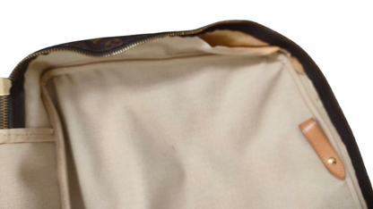 Louis Vuitton Sirius 70 interior showing pocket and vachetta trim