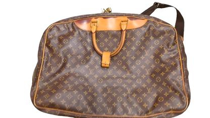 Louis Vuitton Sirius 70 interior pocket detail with vachetta leather tab