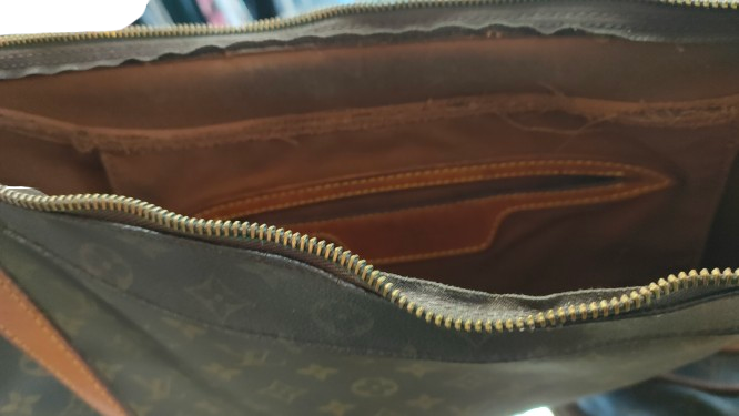 Louis Vuitton Boulogne MM interior showing brown fabric lining
