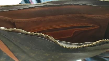 Louis Vuitton Boulogne MM interior showing brown fabric lining