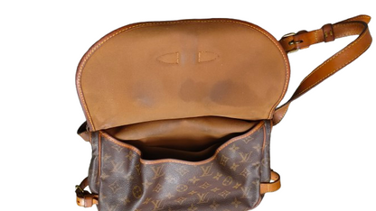 Louis Vuitton Saumur 30 second interior vachetta flap panel showing staining condition
