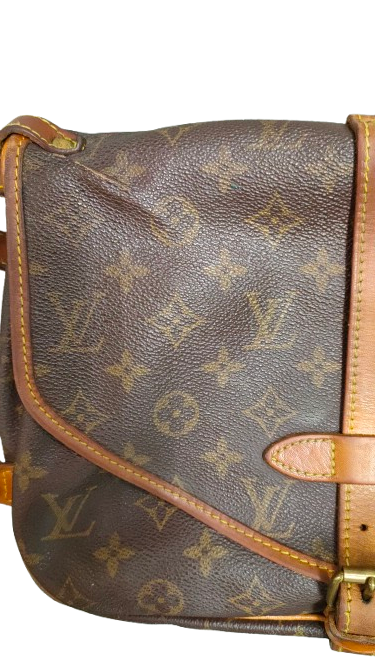 Louis Vuitton Saumur 30 Monogram Canvas crossbody bag front view showing flap and strap
